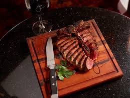 Jeff Ruby's Steakhouse signature dishes New York Strip, Filet Mignon, Porterhouse Steak